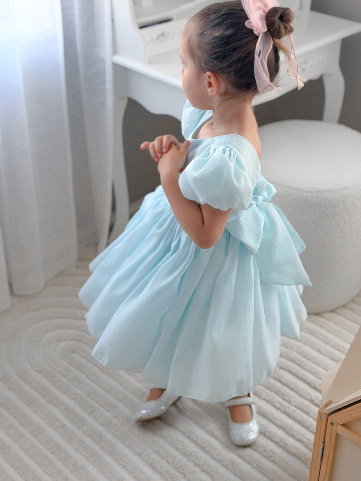 Girls light blue dress with soft sheen fabric and large back bow
