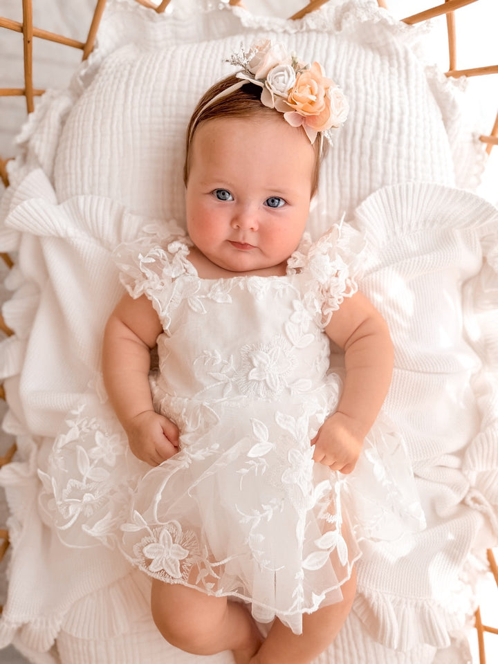 Petal white embroidered baby romper with puff sleeves