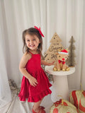 Detail of frill hem and cotton texture on Holly Girls Christmas Dress