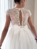Back view of Abby Grace White Lace Dress – button-up open back with tulle bow