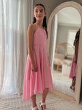 Side view of pink hi-low chiffon dress with layered movement