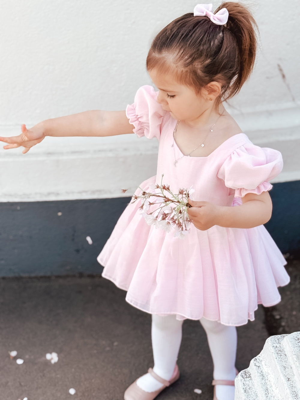 Girls puff sleeve and sparkle fabric on Arabella pink baby flower girl dress