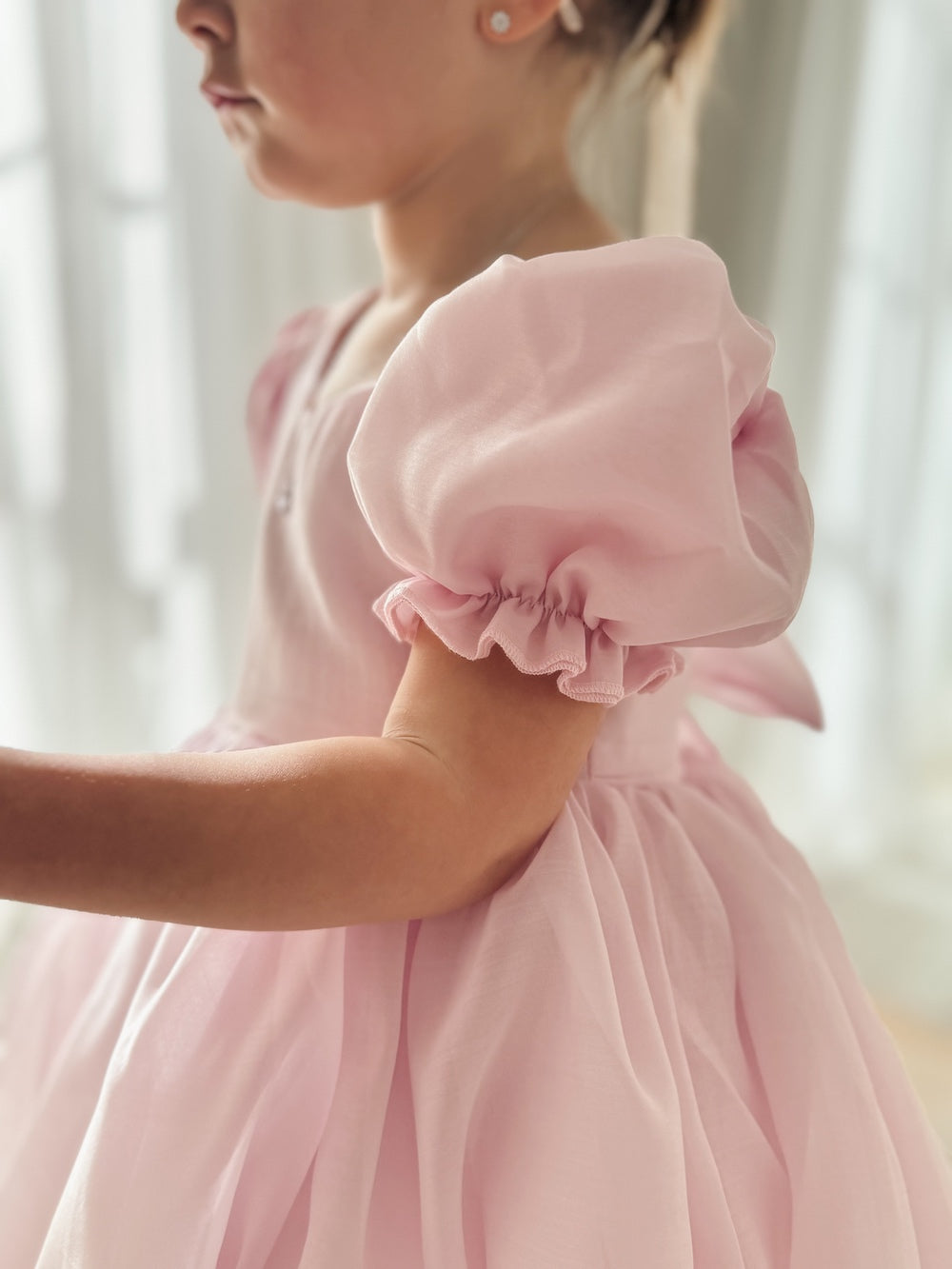 Puff sleeve pink dress for girls with open back and tie bow