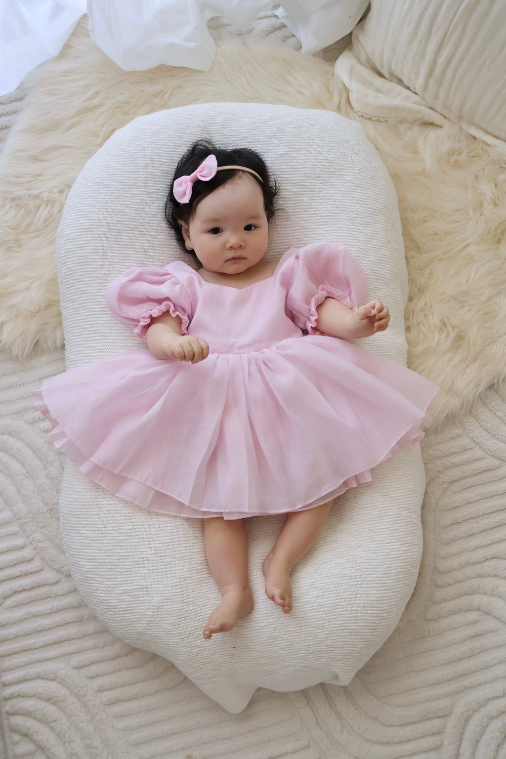 Soft pink baby girls special occasion dress