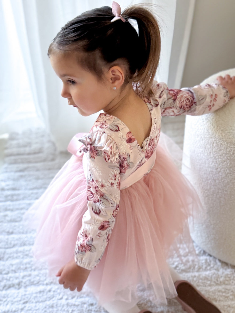 Back view of Audrey Rose Girls Long Sleeve Dress – light pink skirt and satin sash bow