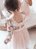 Soft tulle and floral cotton fabric close-up of Audrey Rose girls long sleeved party dress