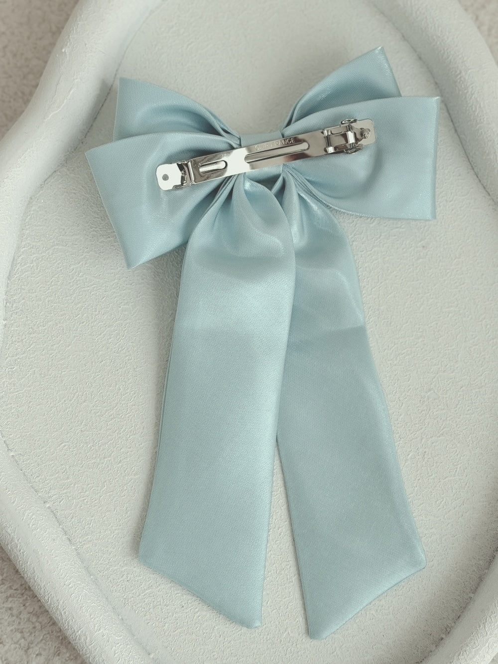 Amelie Blue Satin Bow styled for occasion wear