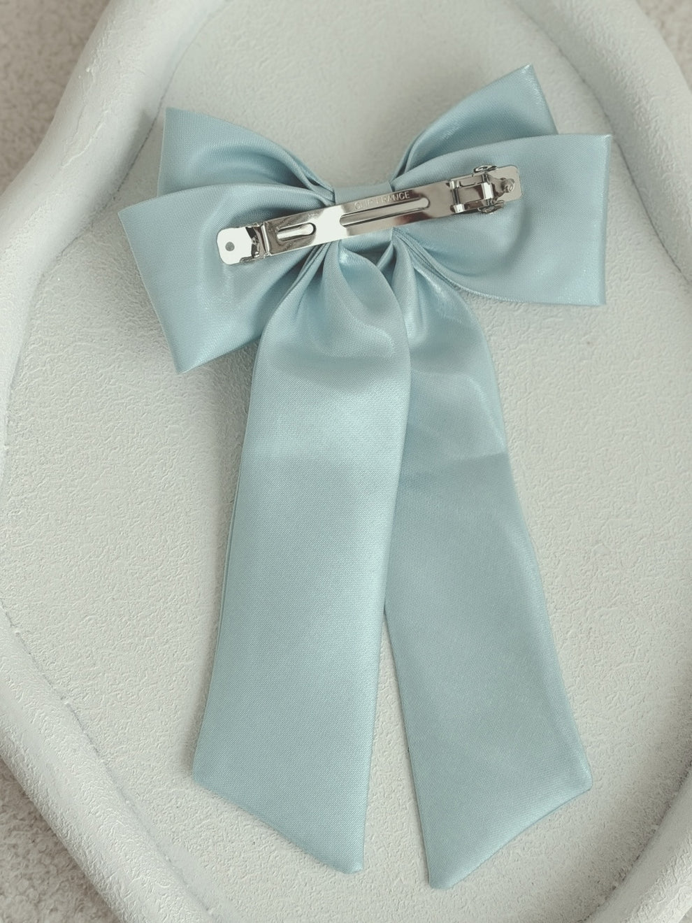Amelie Blue Satin Bow styled for occasion wear