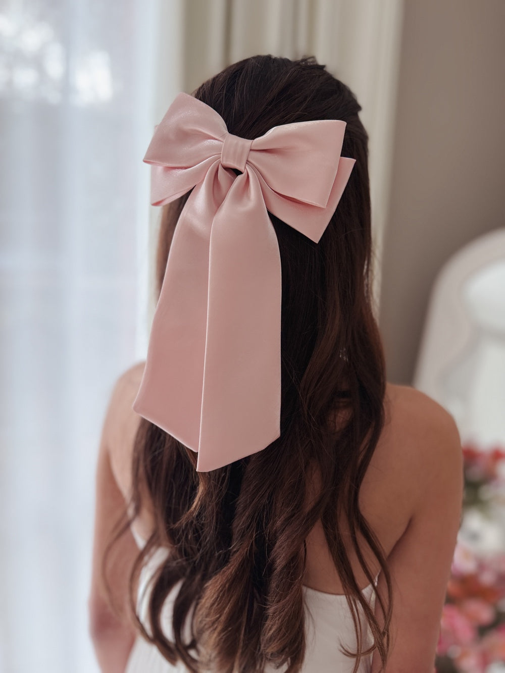 Girls pink bow accessory for party dresses
