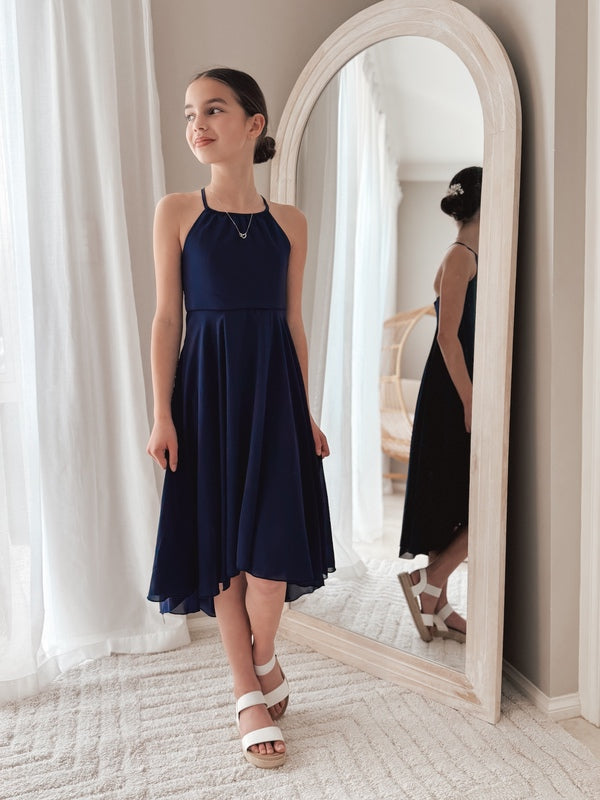 Graduation-ready dress in navy blue shown in standing pose