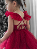 Baby romper with tie-up back and red sparkle tulle skirt