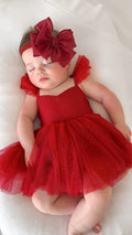 Front view of Belle red sparkle baby dress with cotton lining