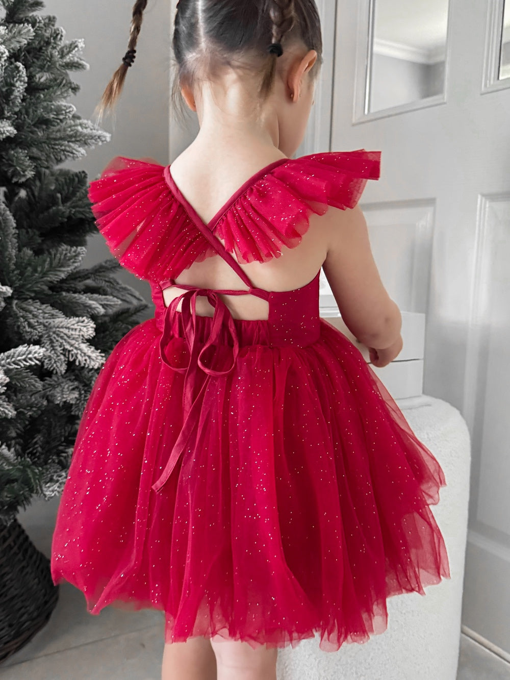 Red sparkle Christmas dress with tie-up back and flutter sleeves