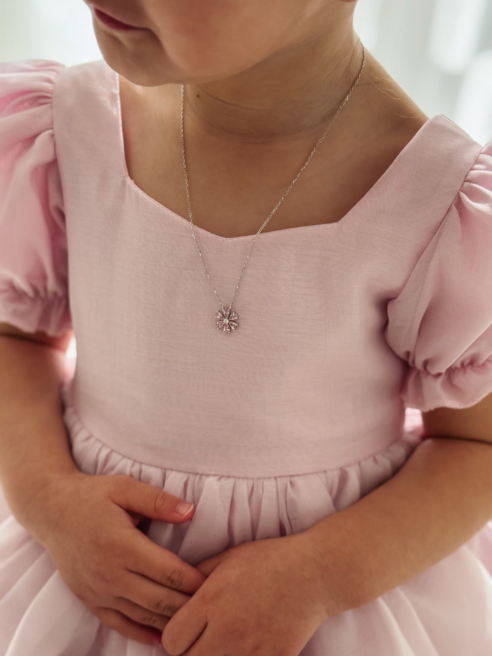 Girls silver jewellery with delicate pink bloom pendant