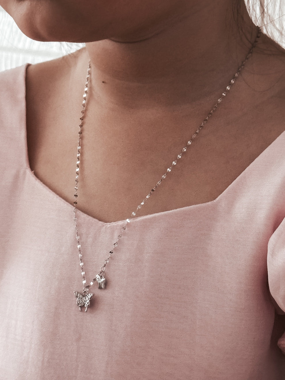 Butterfly Whispers necklace styled with jewellery collection