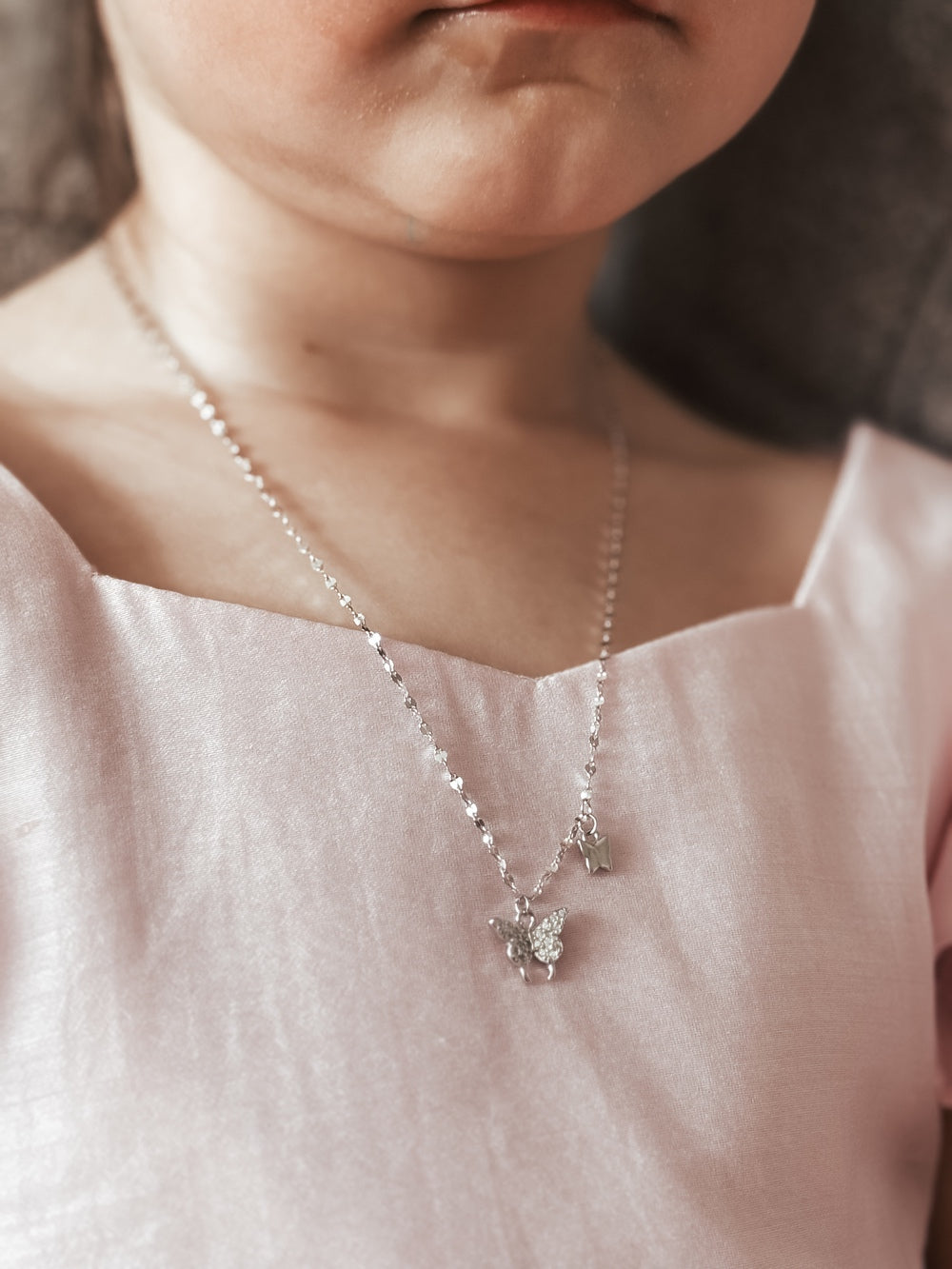 Butterfly Whispers Girls Silver Necklace - All ProductsClose-up of Butterfly Whispers Girls Silver Necklace on white background