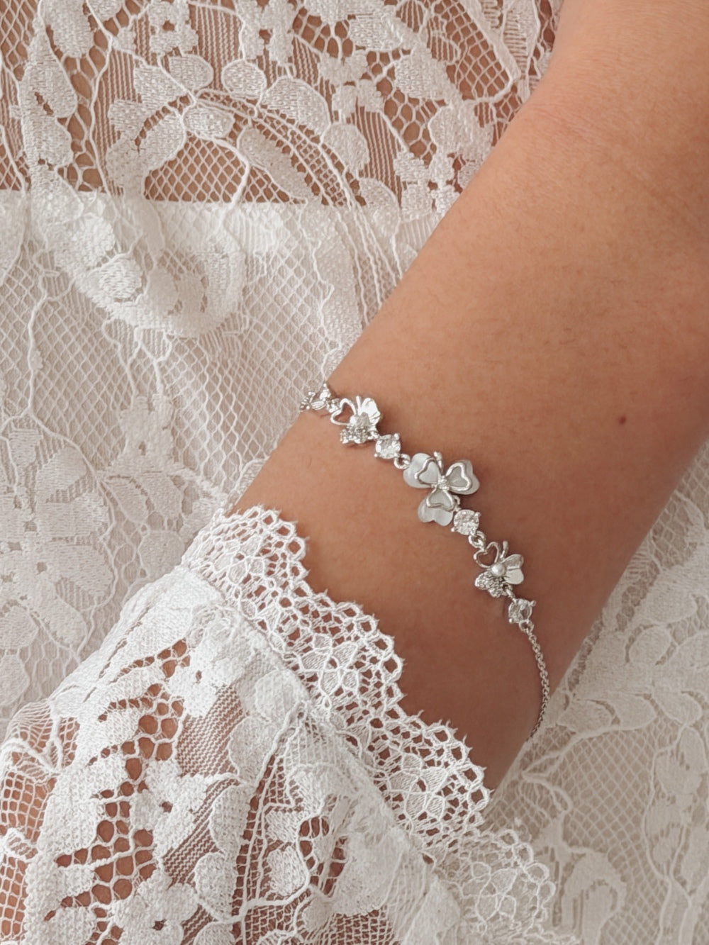 Girls silver bracelet with flowers and sparkling stones