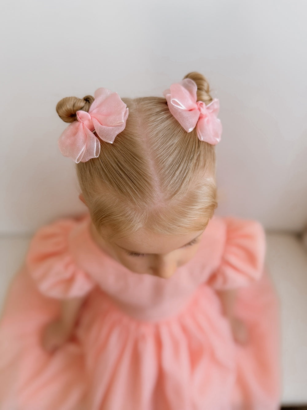 Soft blush peach hair bows for girls’ pigtails