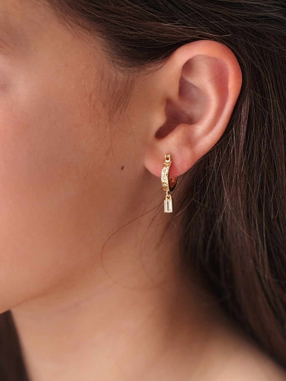 Front view of Celestial Girls Gold Hoop Earrings – dainty gold hoops with celestial detail