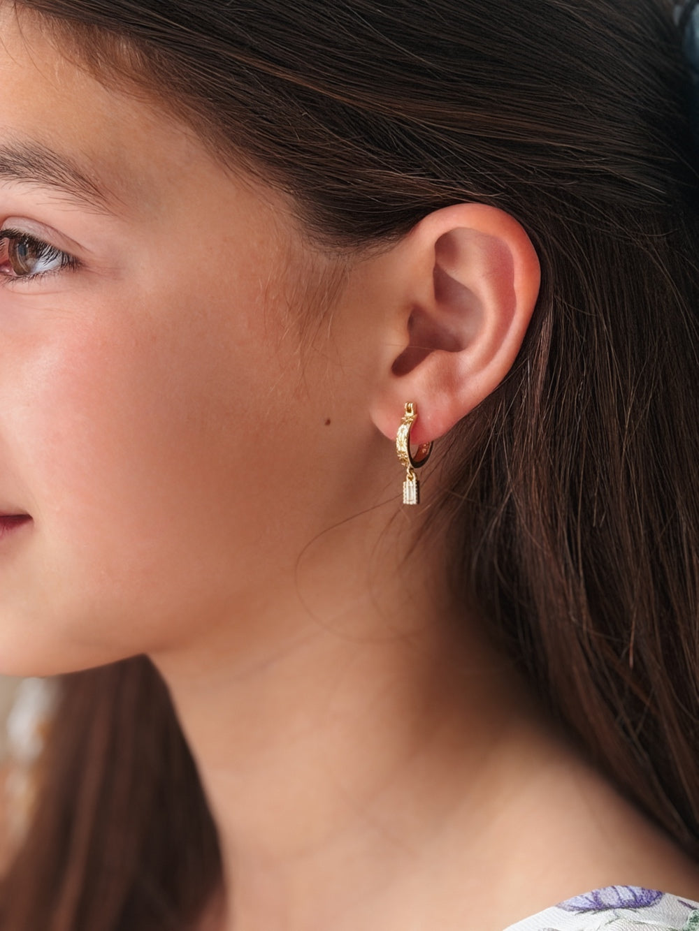 Close-up of Celestial Girls Gold Hoop Earrings – tiny stars with sparkling diamante