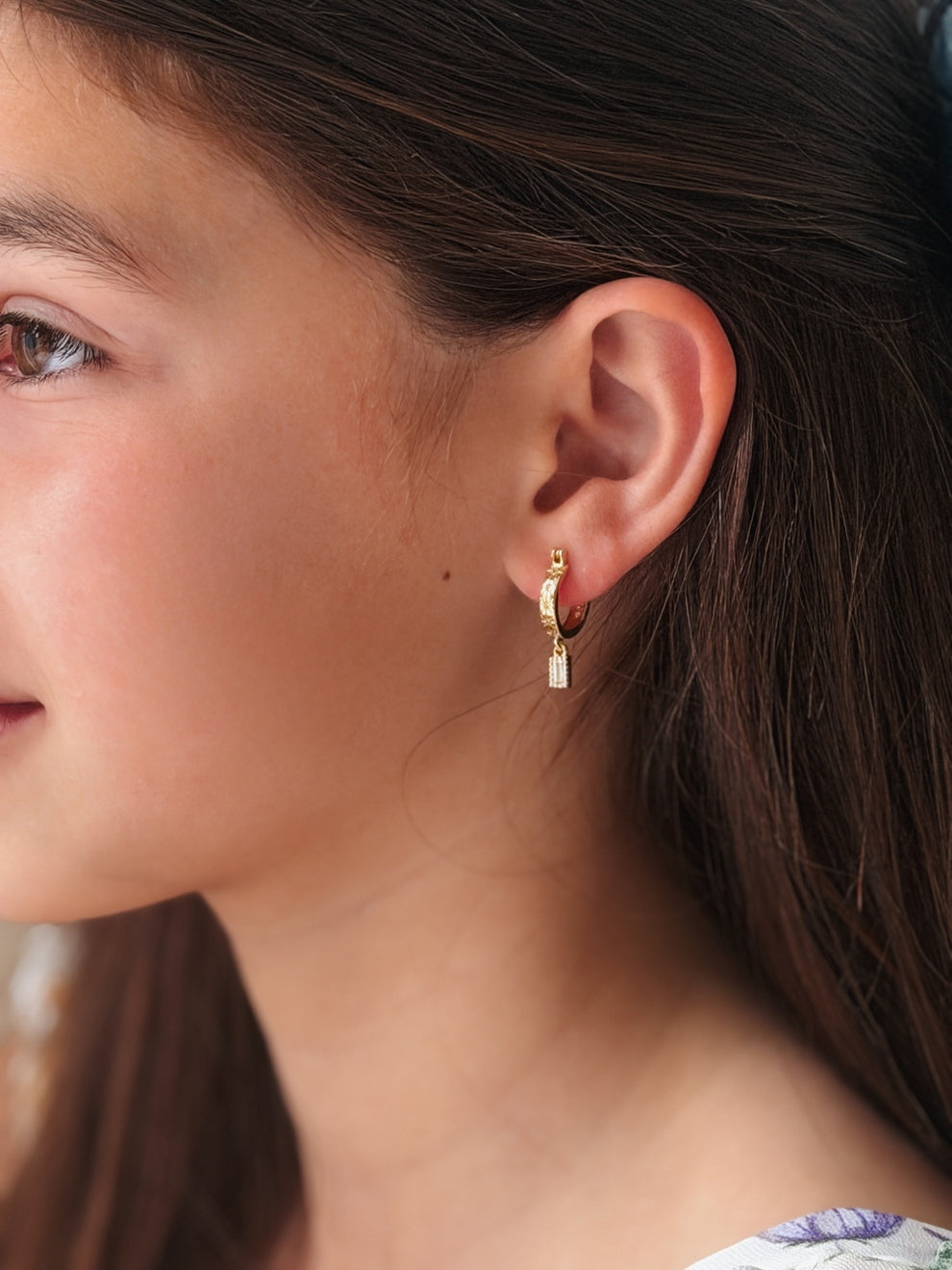 Close-up of Celestial Girls Gold Hoop Earrings – tiny stars with sparkling diamante