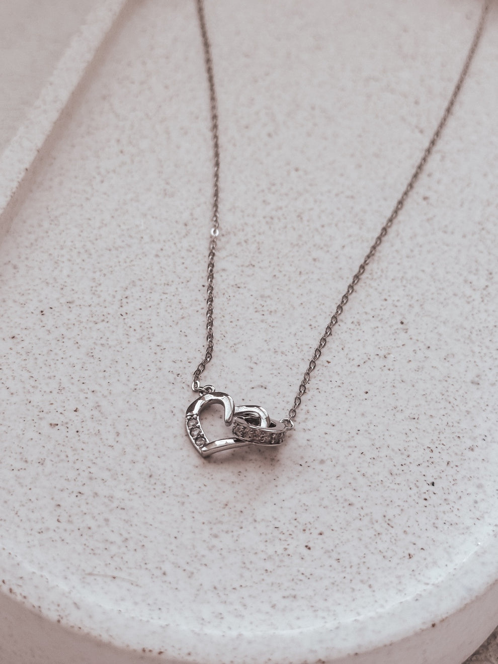 Silver girls graduation necklace with heart and circle charm