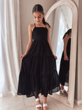 Black girls' maxi dress styled for events and formal gatherings