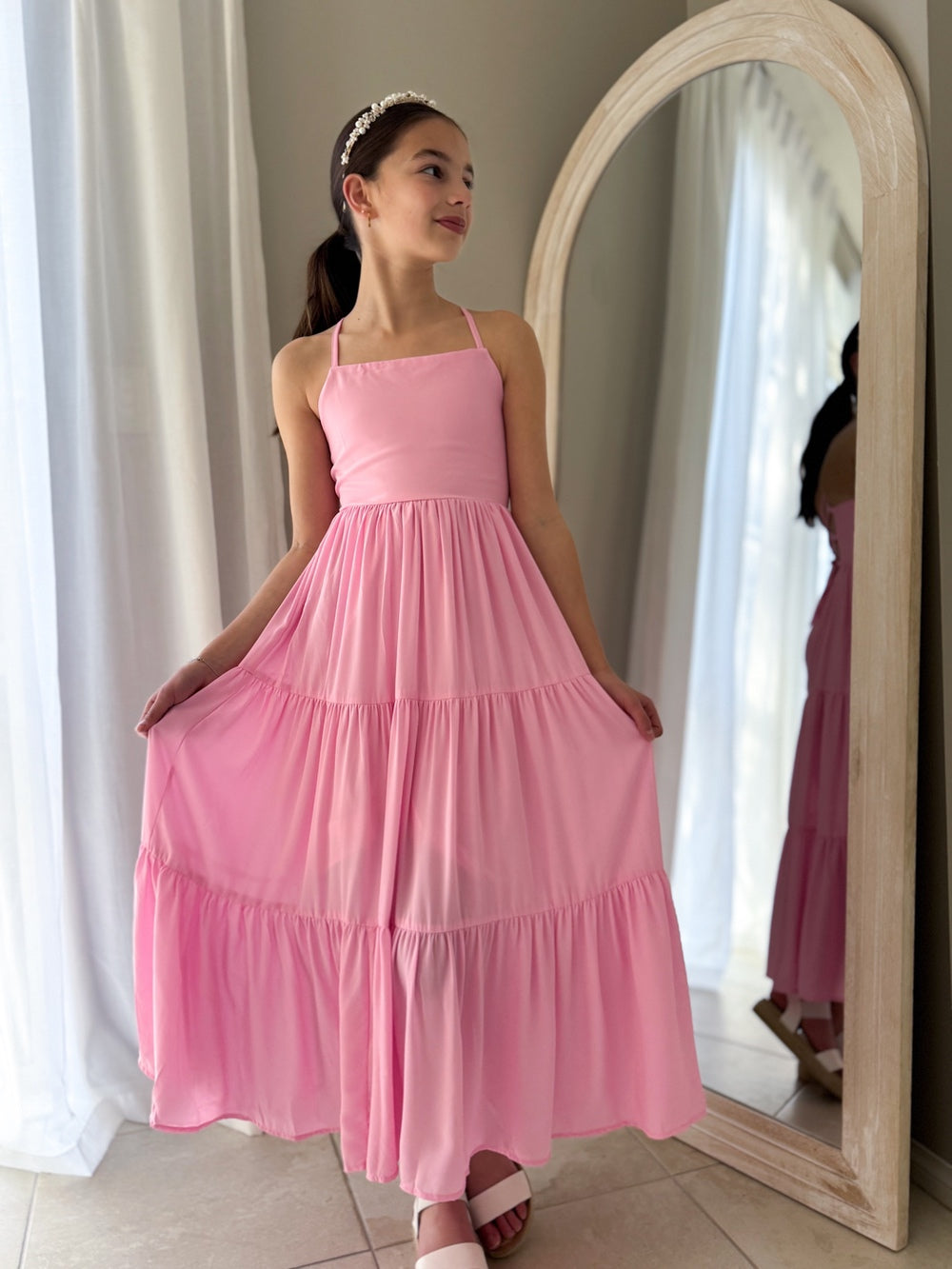 Tween girl wearing Clara pink maxi dress with square neckline and soft tiered skirt