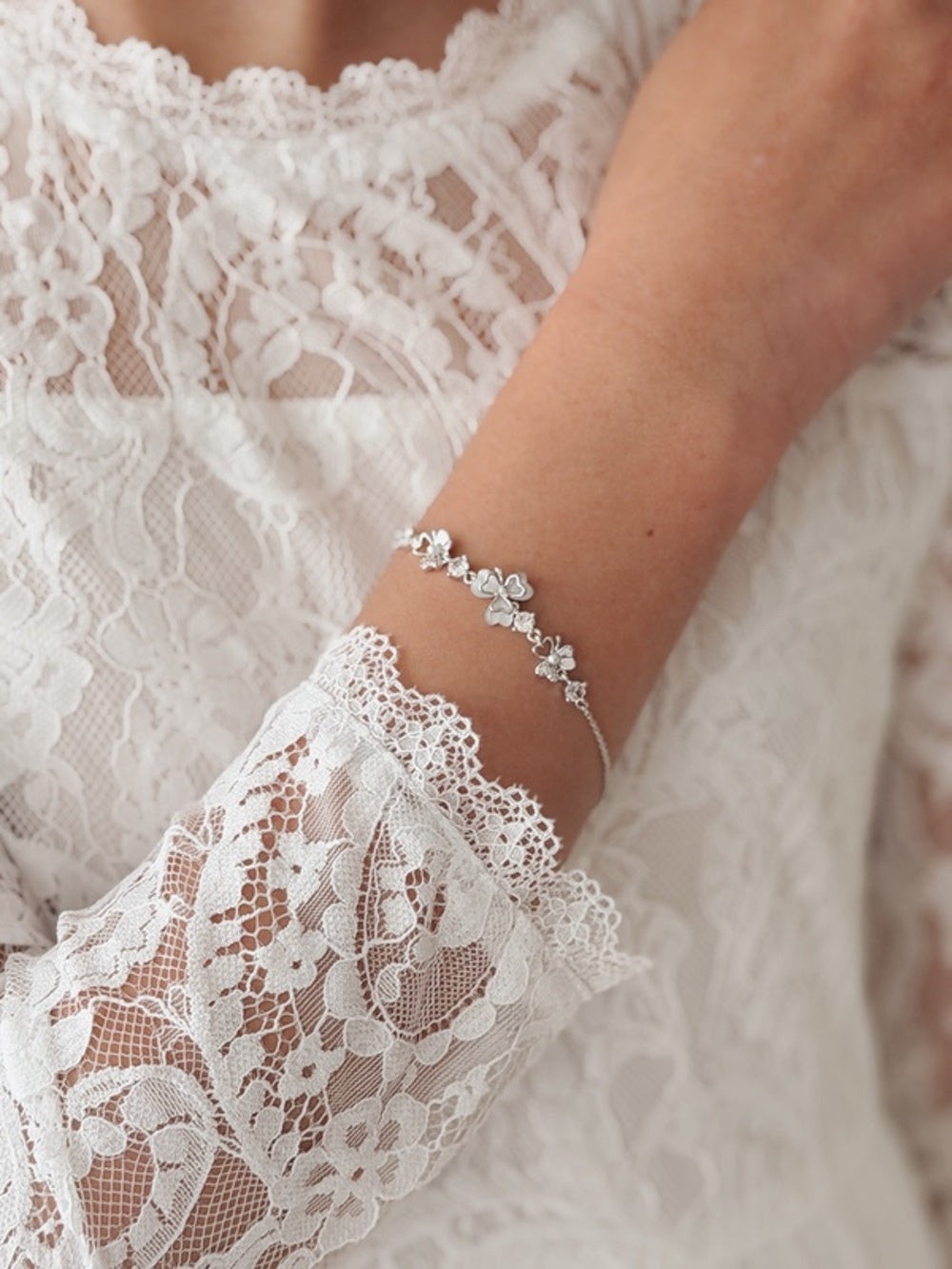 Girls silver bracelet with flowers and sparkling stones