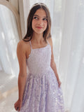 Clarissa lilac flower girl dress, neckline and slim strap detail.