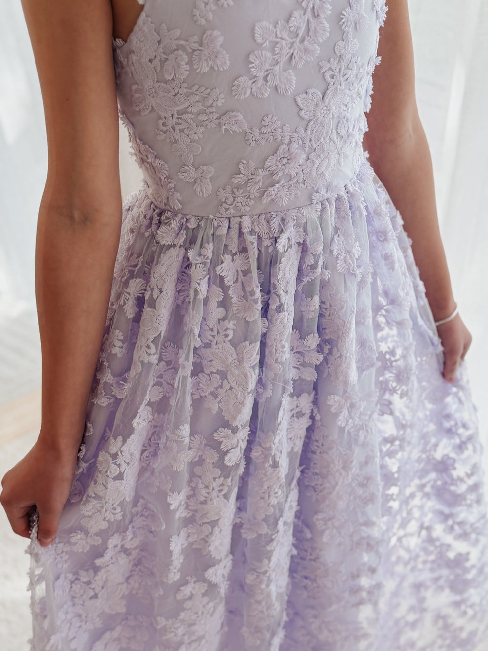 Clarissa lilac 3D flower girl dress, close-up of the floral bodice and gathered skirt.