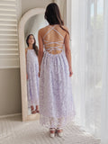 Clarissa lilac 3D flower girl dress, full-length back view showing lace-up straps beside a mirror.
