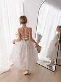 Clarissa white floral gown showing adjustable lace-up back