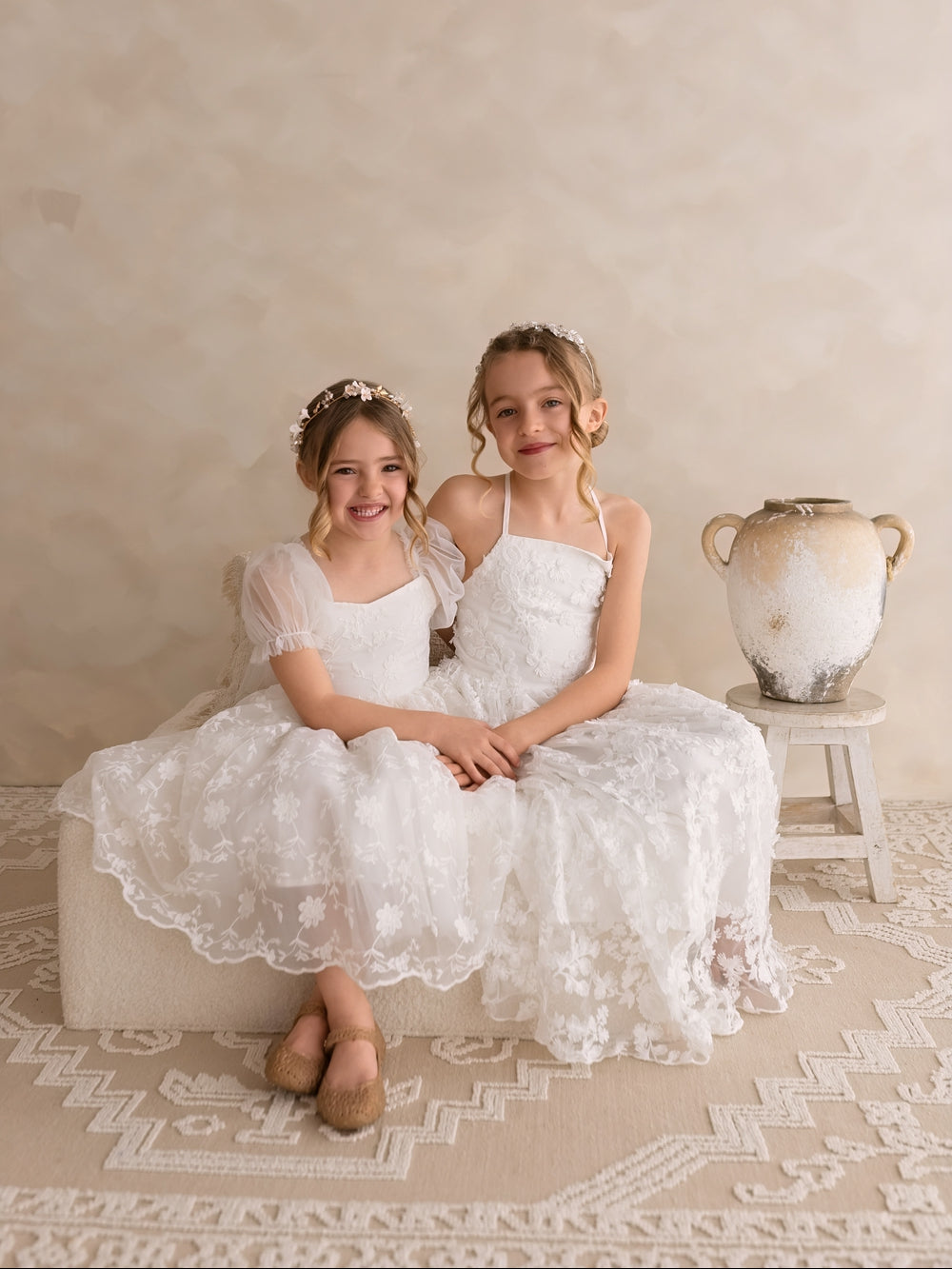 Romantic white flower girl gown with intricate 3D flower embellishments