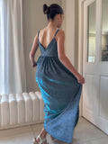 Claudia blue-green girls formal dress, three-quarter rear view of the skirt.