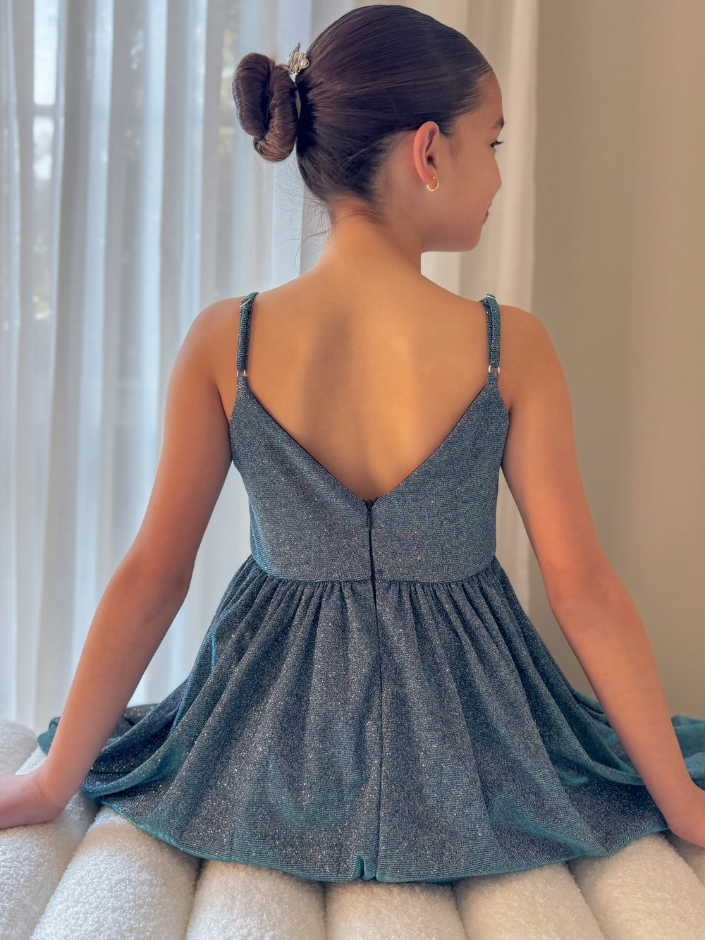 Claudia blue-green girls formal dress, seated V-back detail.