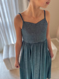 Claudia blue-green girls formal dress, fitted bodice and slim strap detail.