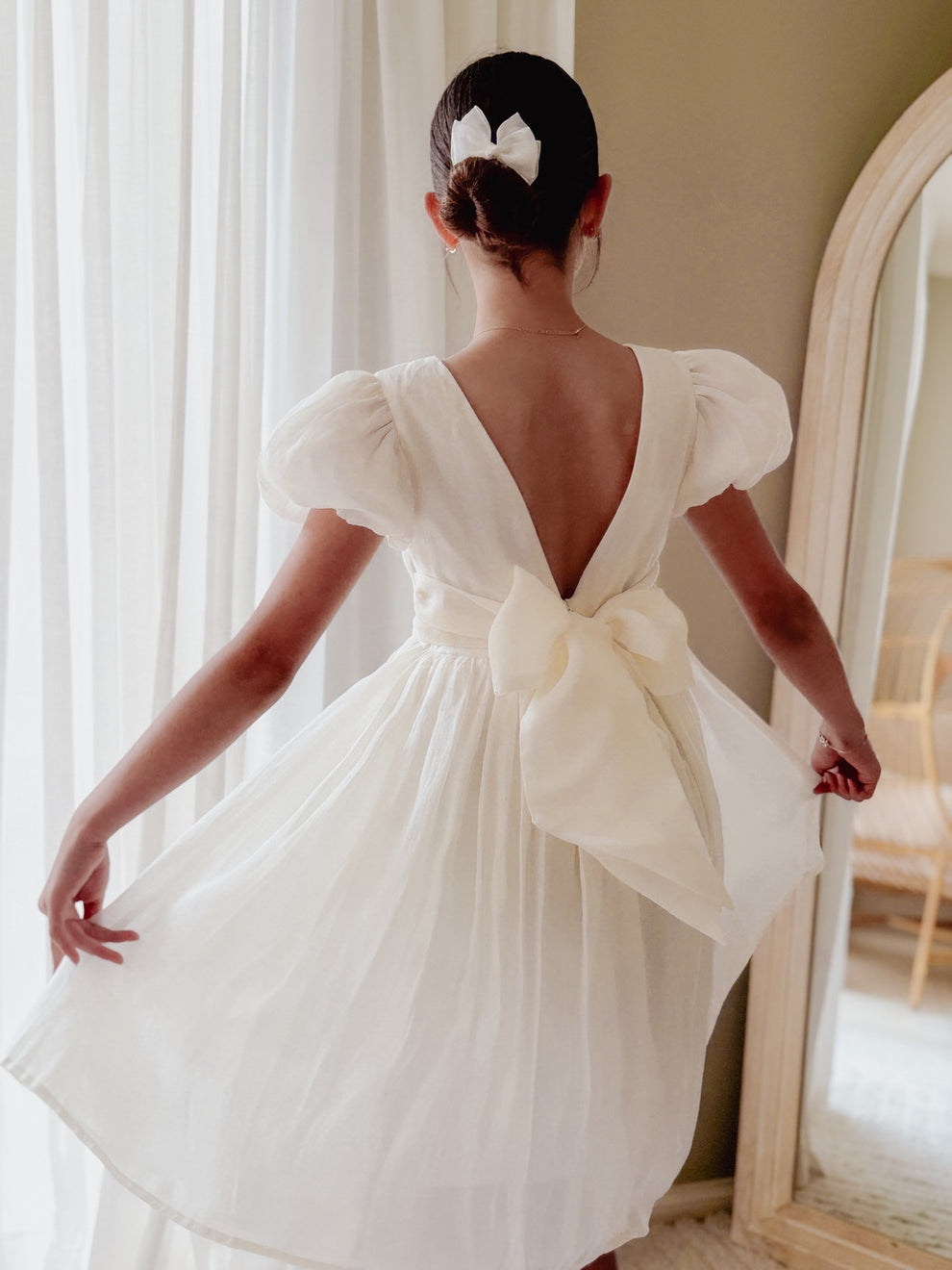 Elegant ivory flower girl dress with shimmer fabric