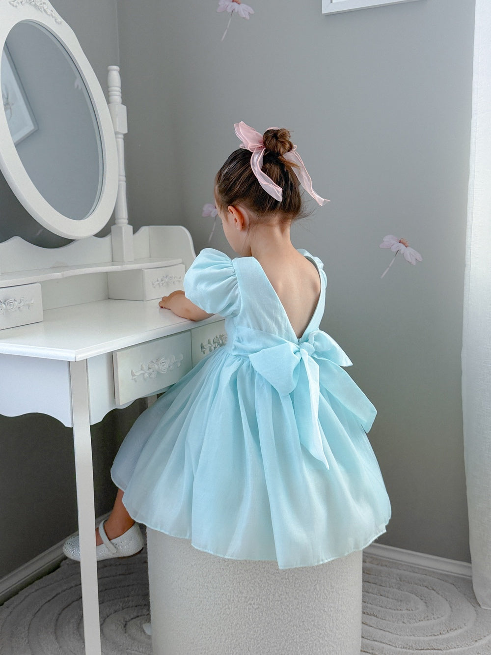 Delia Girls Pale Blue Dress with elegant V-back and statement bow for weddings