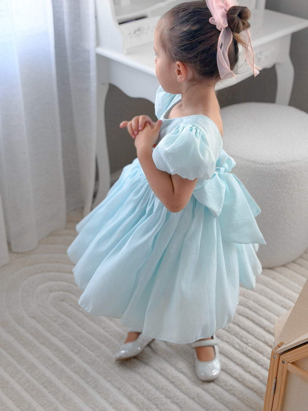 Girls light blue dress with soft sheen fabric and large back bow