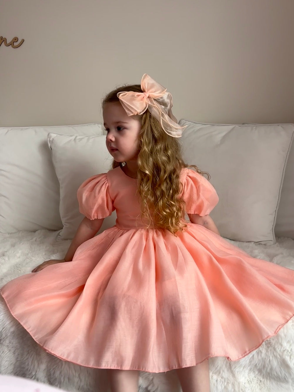 Peach flower girl dress with soft cotton lining and elegant silhouette — Delia collection