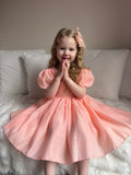 Delia Girls Peach Dress with puff sleeves and V-back bow – elegant flower girl dress in peach