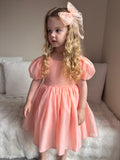 Peach girls bow accessory for weddings and birthdays