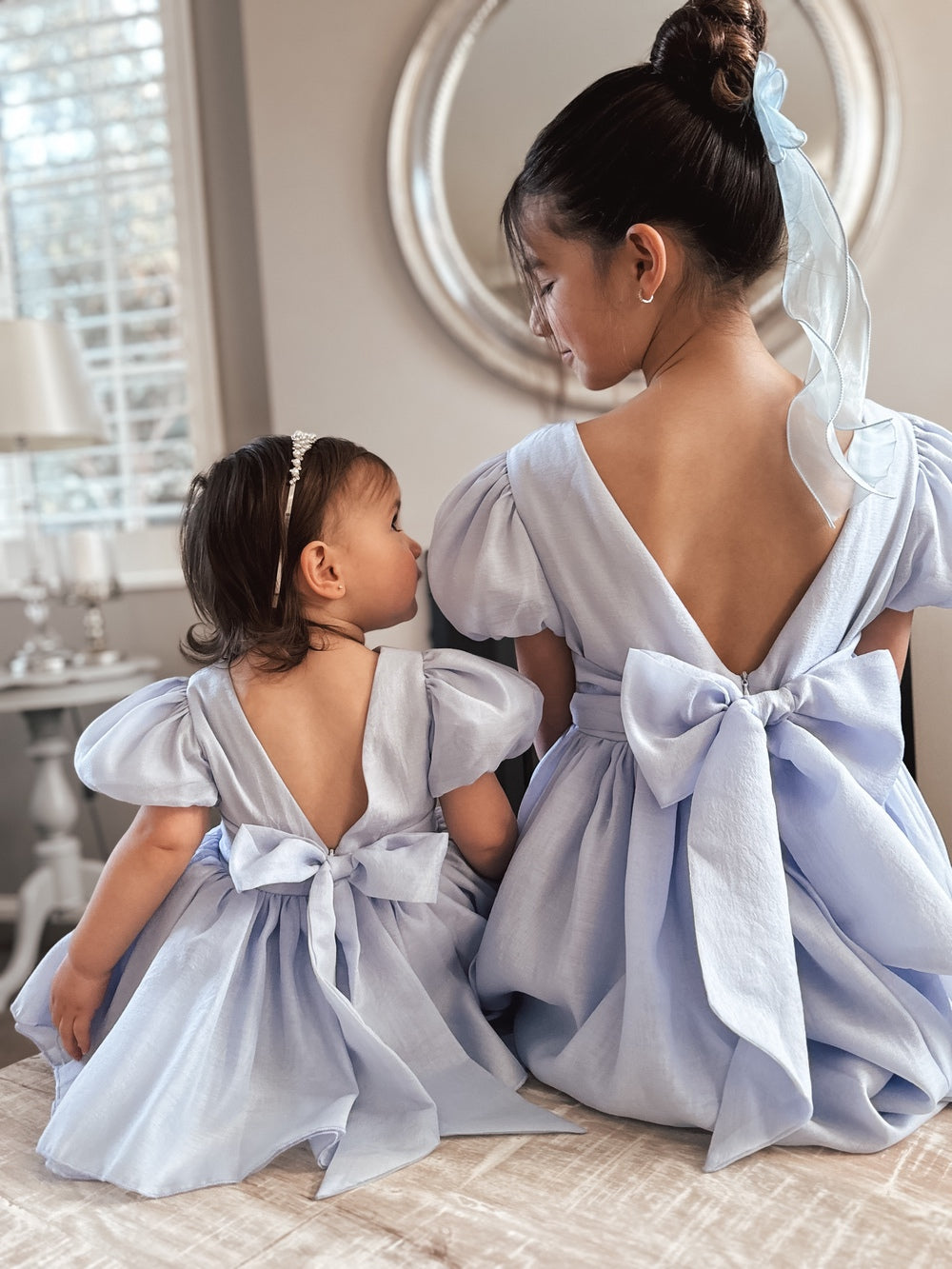 Sister matching dusty blue flower girl dresses