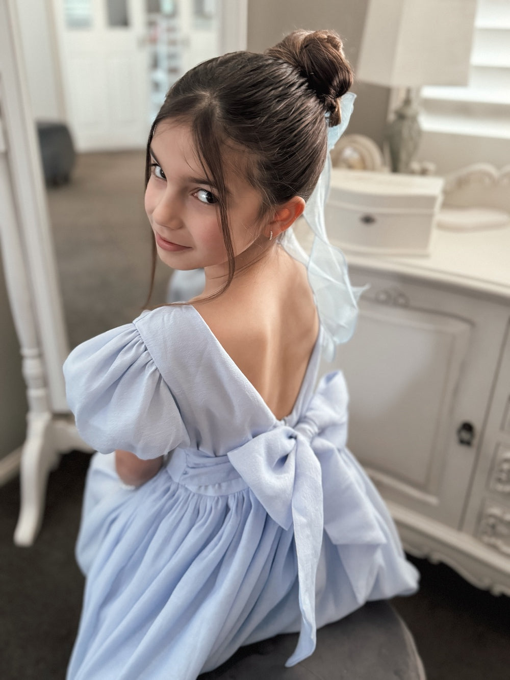 Light blue girls party dress with large bow
