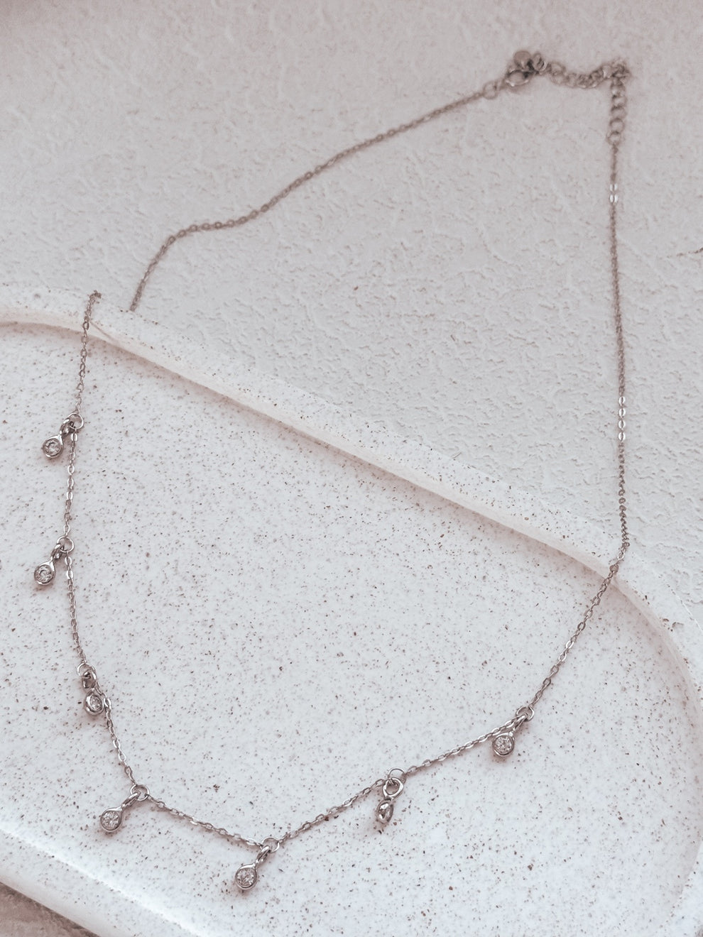 Girls silver necklace with seven sparkling diamante round charms