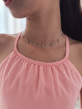 Shine‑accented girls necklace with delicate silver chain and charms