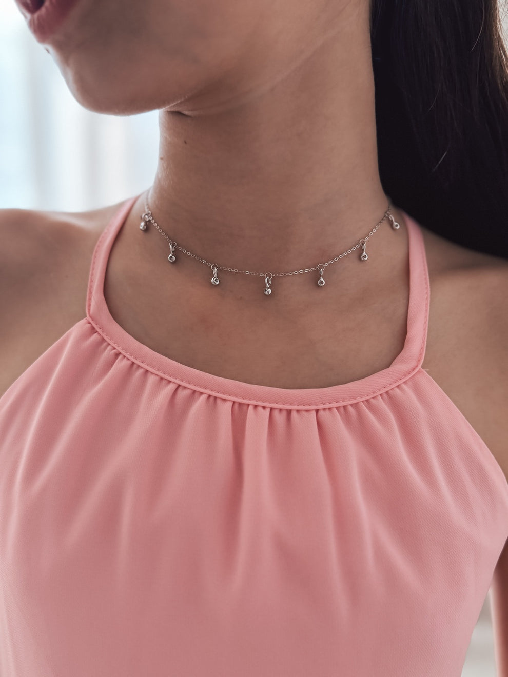 Shine‑accented girls necklace with delicate silver chain and charms