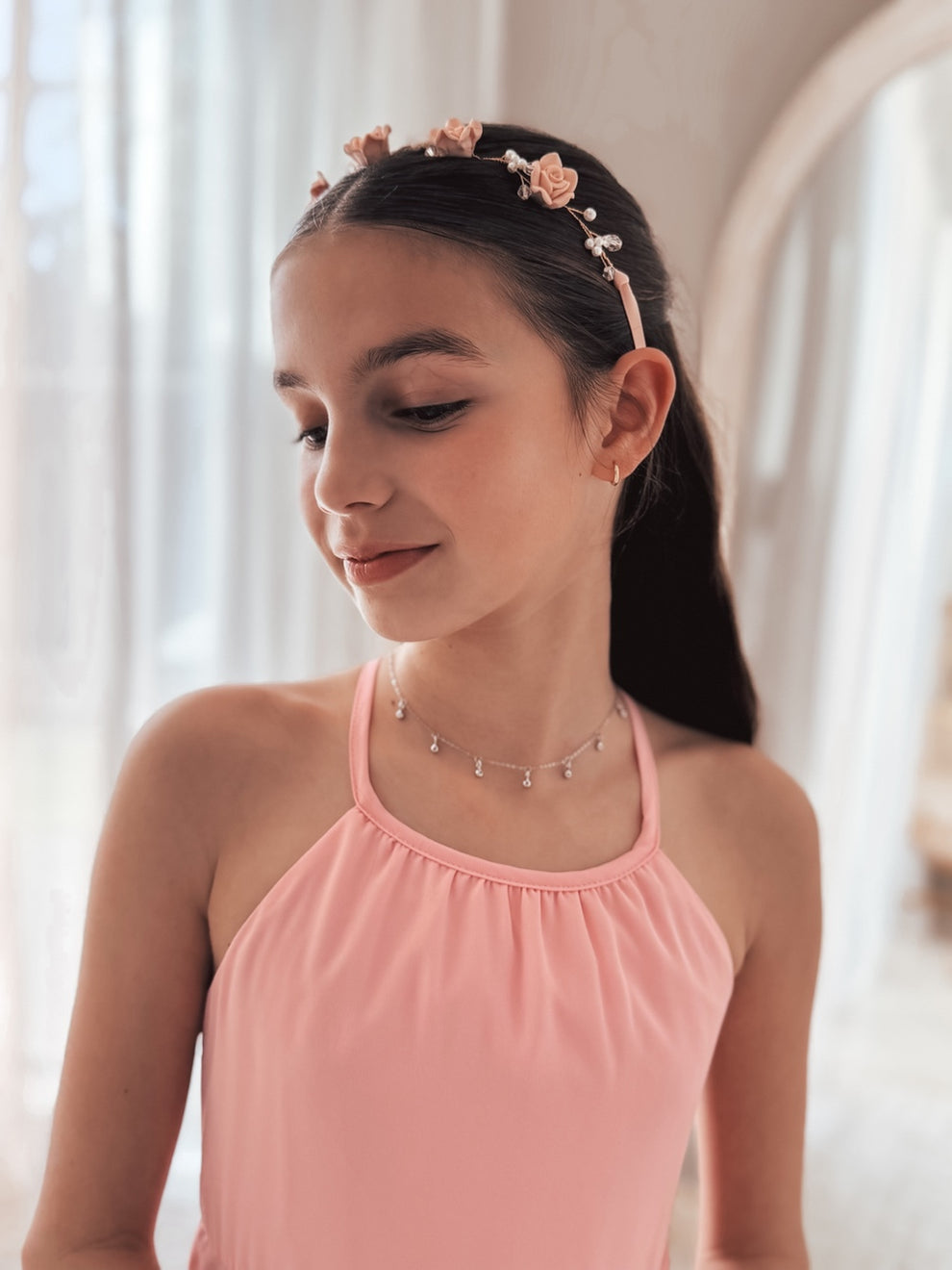 Elegant silver necklace with multiple sparkly charms for girls