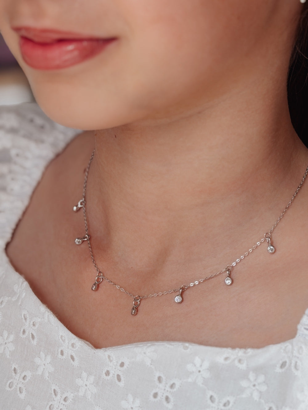Close-up of Dewdrop necklace showing rows of diamante charms